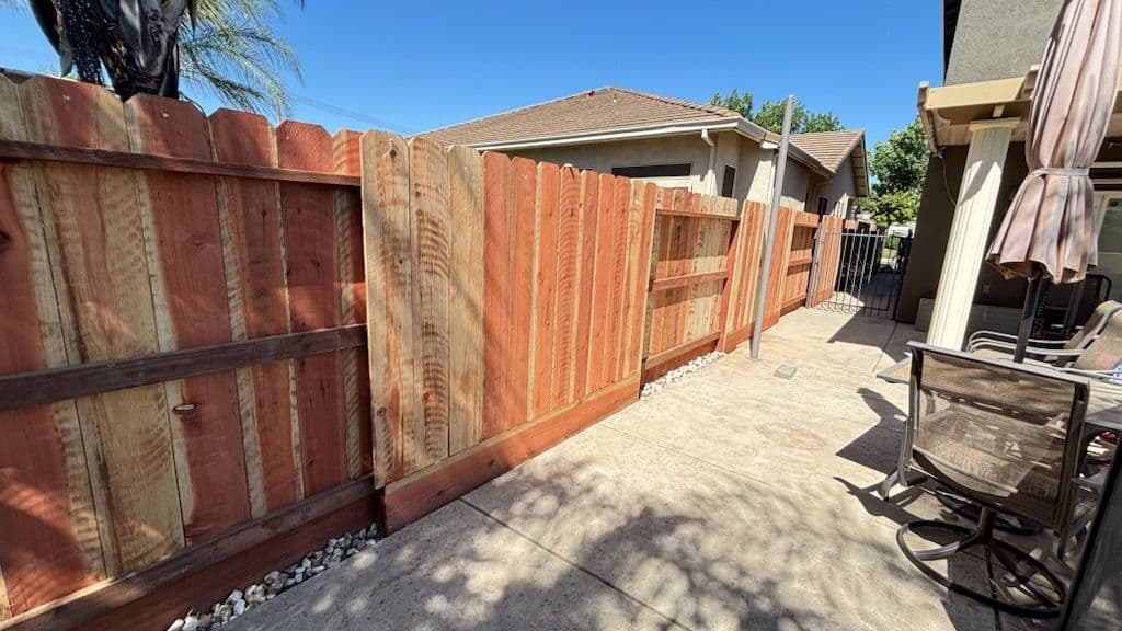 Enhanced Curb Appeal with Synthetic Grass and Fencing
