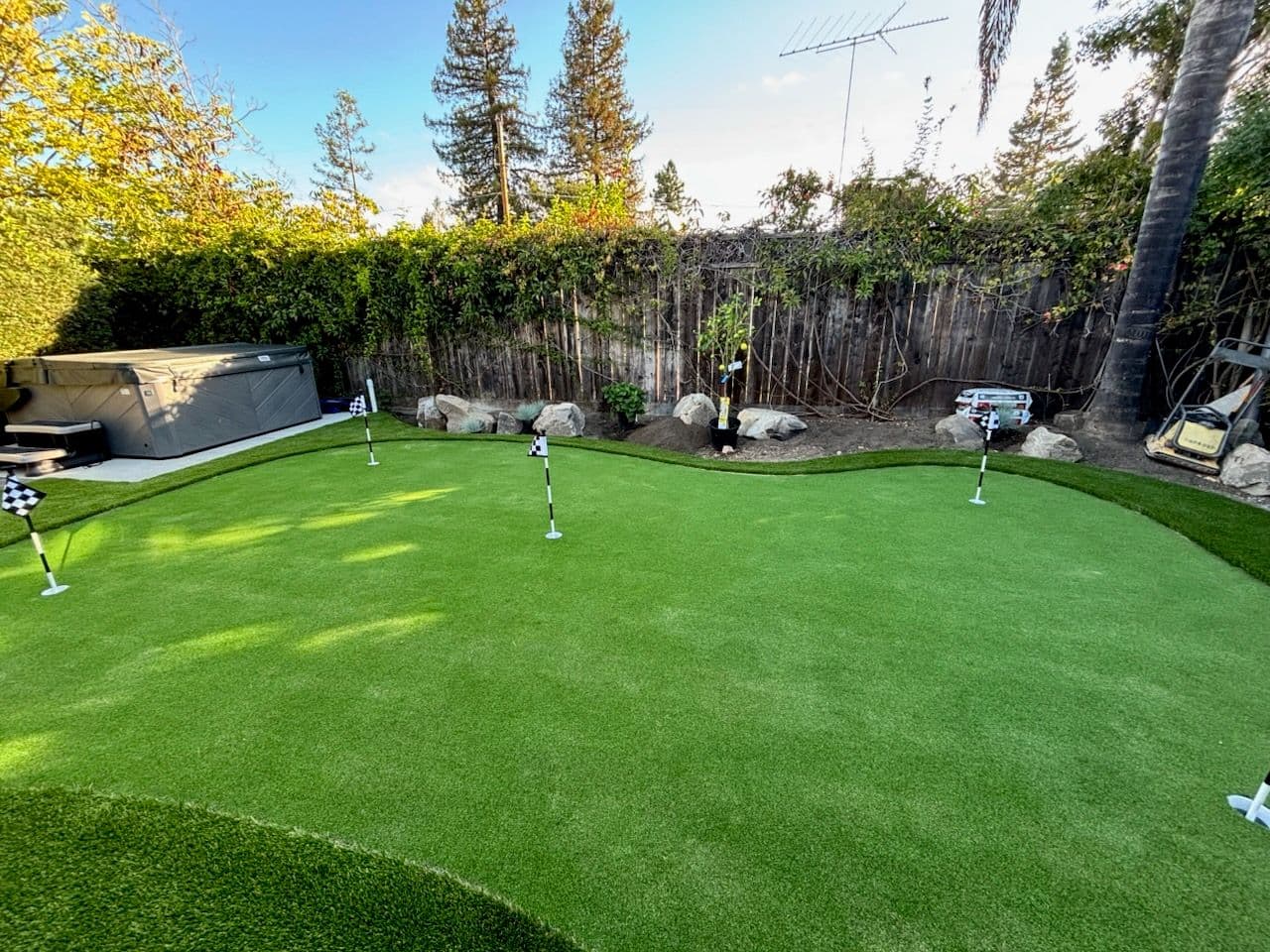 Project Backyard Oasis with Custom Putting Green and Hot Tub image
