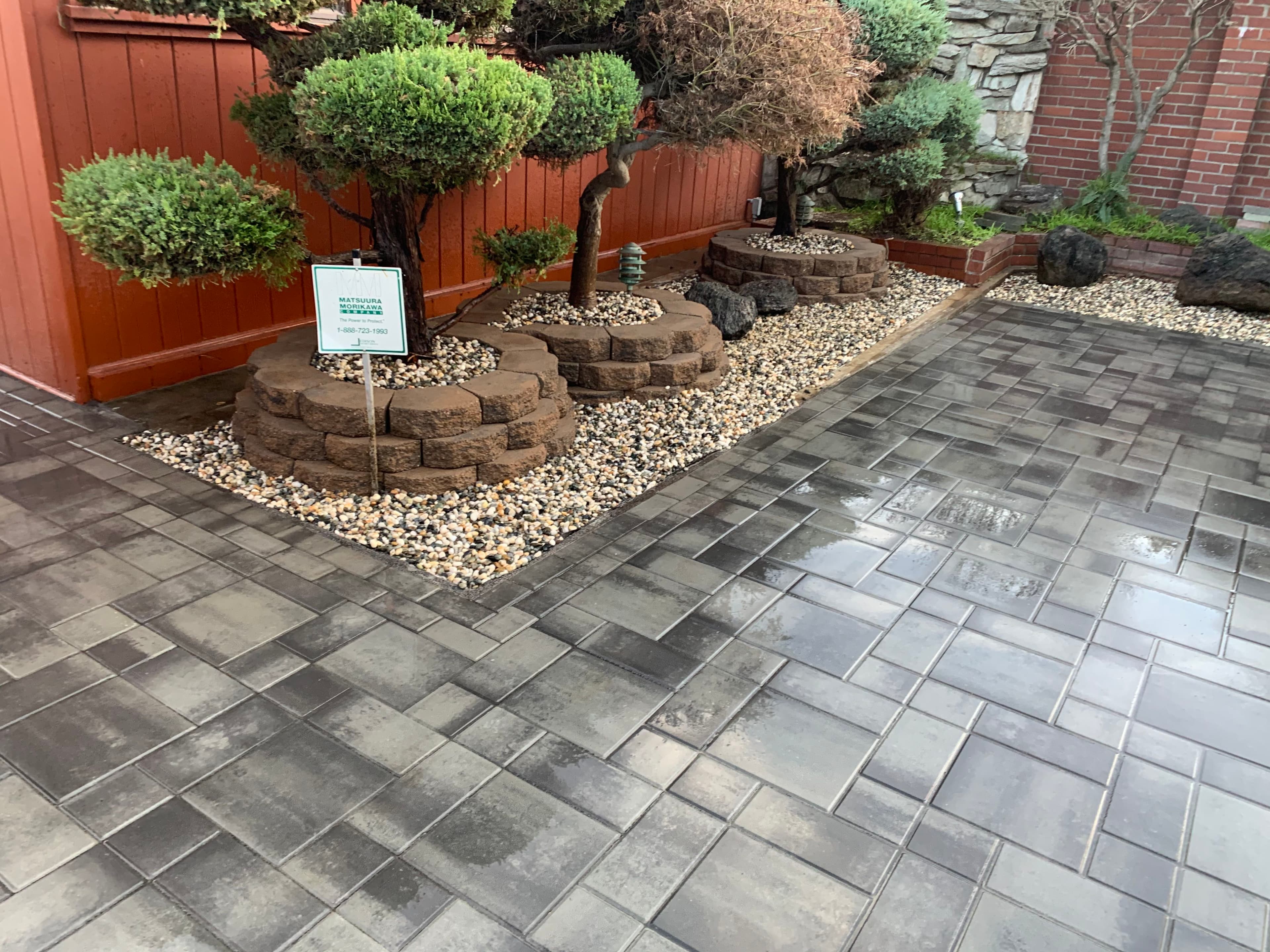 Decorative Paver Installation with Raised Planters High-quality paver installation combined with raised planters for a refined and elegant outdoor space. Built with attention to detail and long-term performance in mind.